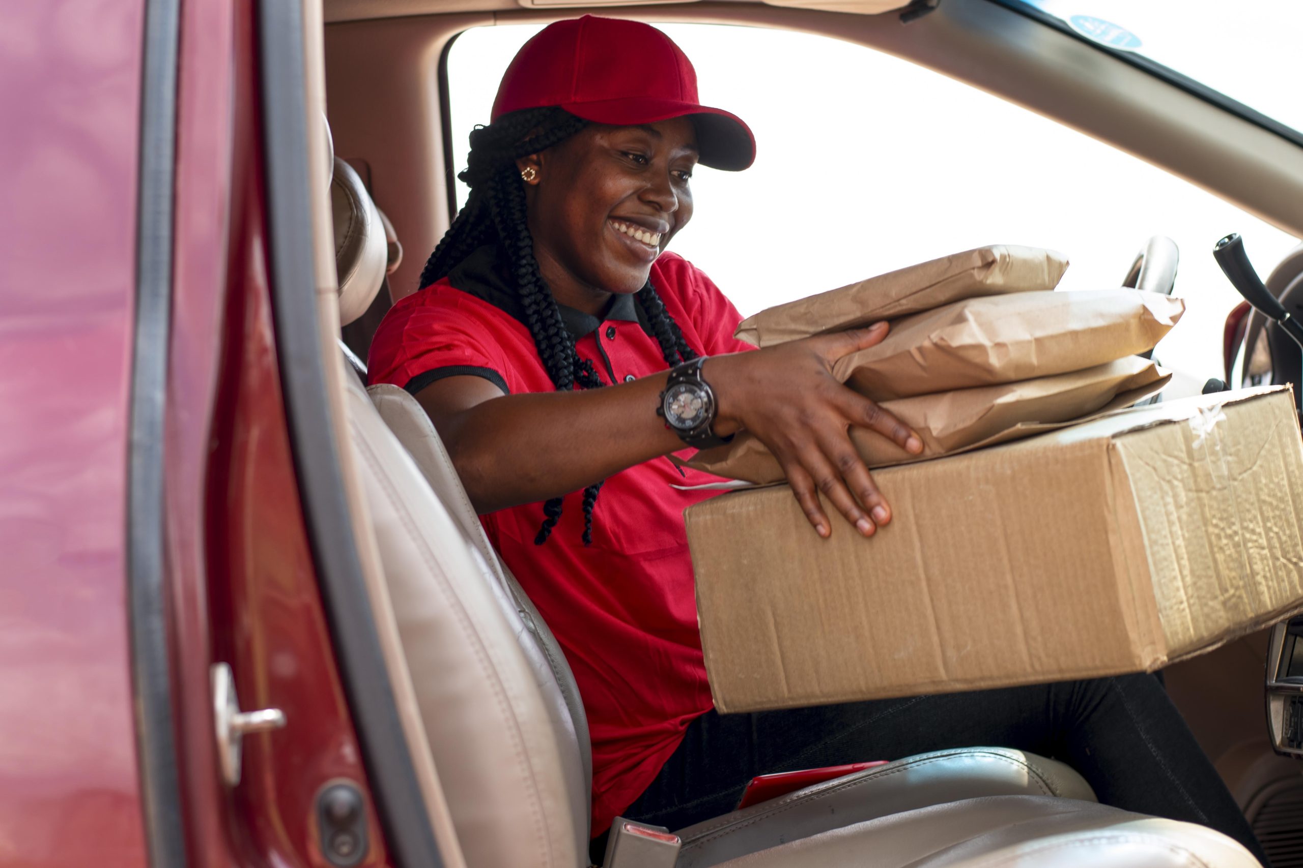 close up delivery person with parcels scaled